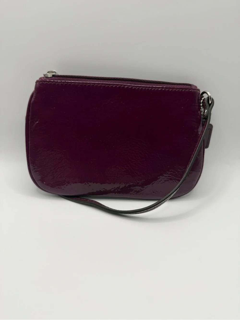 Vintage purple Coach Nolita 19 wristlet